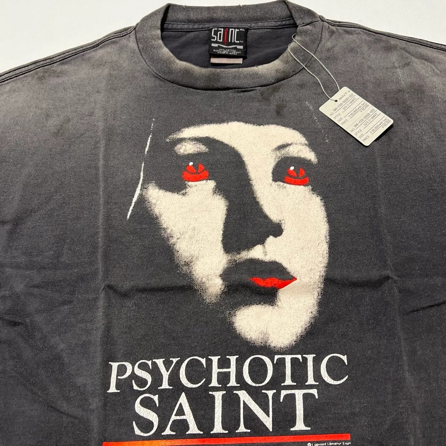 SAINT Mxxxxxx SS TEE/PSYCHOTIC SNT/BLK Gothic heavy metal rock style retro short-sleeved Mysterious woman's face printed distressed TEE Washed black S-XL Same as the original version Cylindrical side seam OE yarn fabric Garment dyeing Faded by heavy washing Bust plaster faded Correct version Matching of original accessories